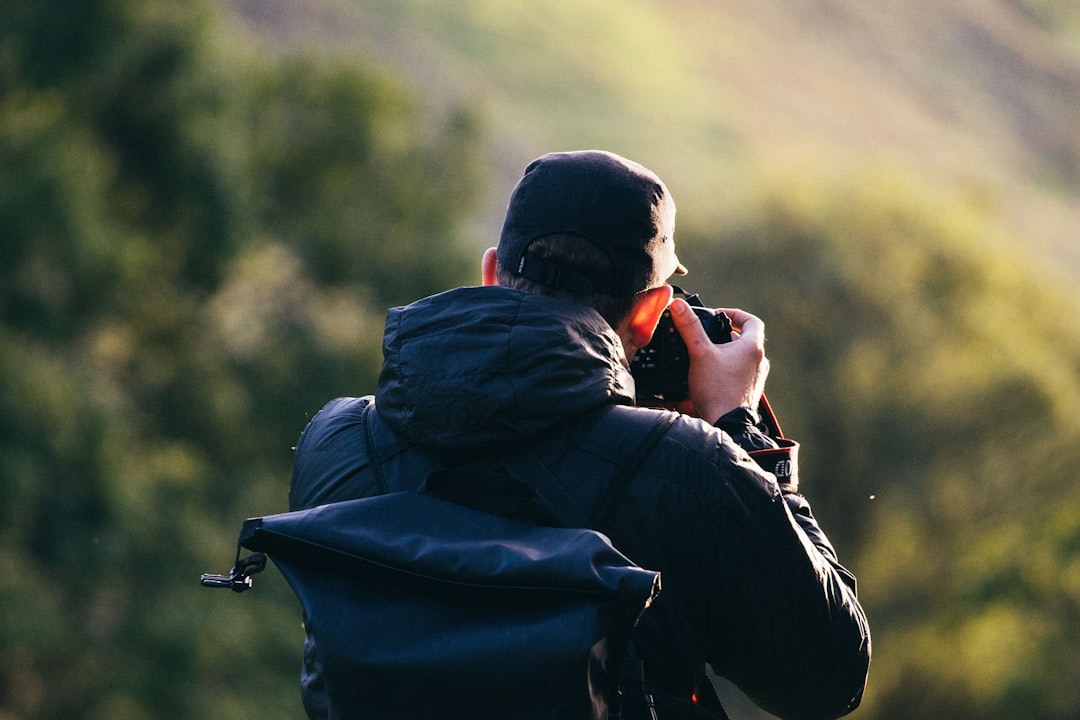 Wildlife photographer capturing birds at sunset in Grizzly Island Wildlife Area