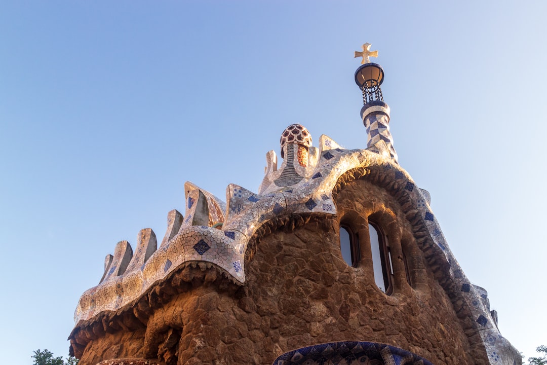 Colorful Gaudi mosaics at Park Guell during barcelona travel photography sessions.