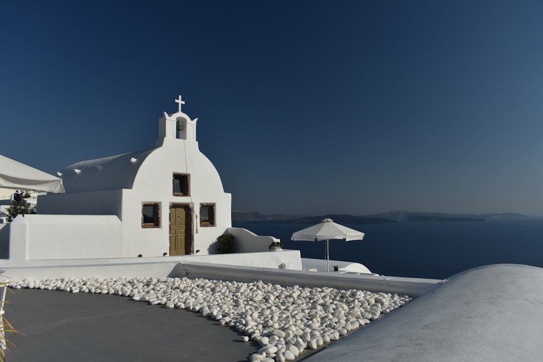 Scenic view of Santorini churches for a europe travel itinerary.