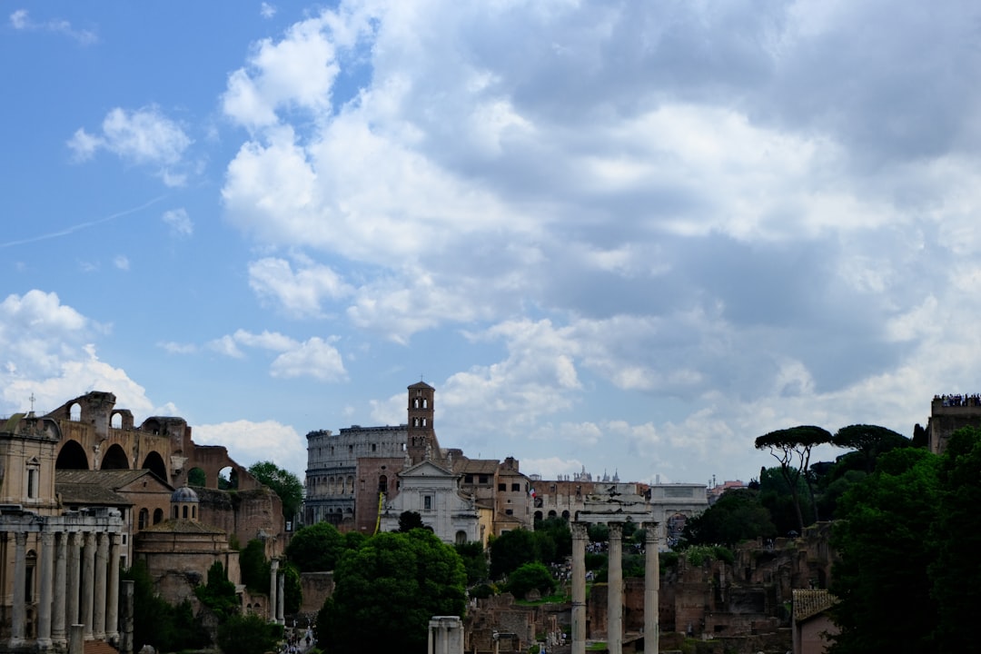 The iconic Roman Colosseum at sunset for a europe guide travel.